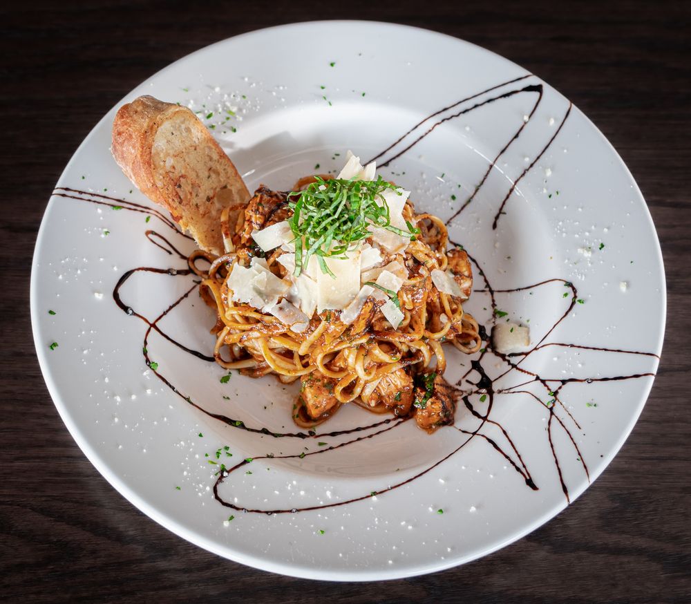 1886 Pasta, overhead view with garlic bread